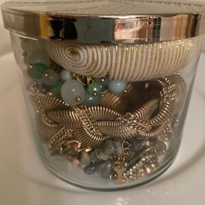 Vintage mystery jewelry jar with gold tone pieces. necklaces bracelets rings
